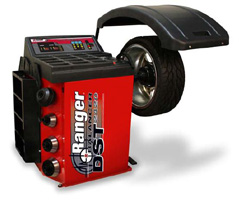 How do you use a tire spin-balancing machine?